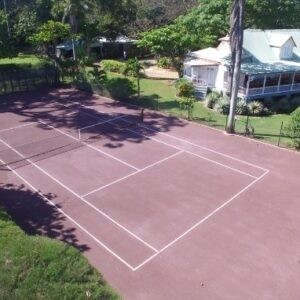 Red clay tennis court at Llantrissant